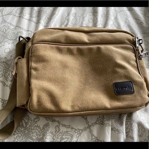 Good as new!  Losmile brown messenger bag.